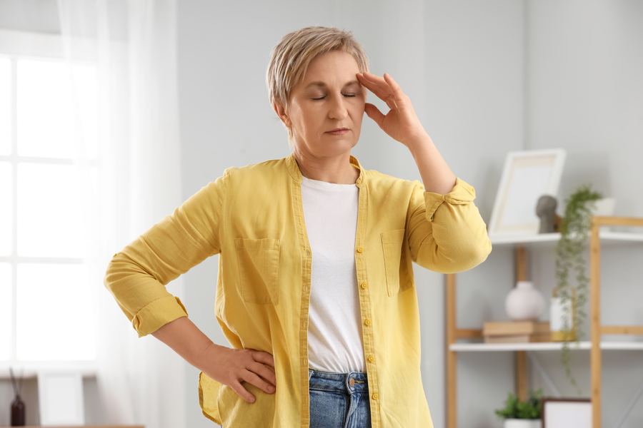 Woman frustrated with stalled weight loss despite effort